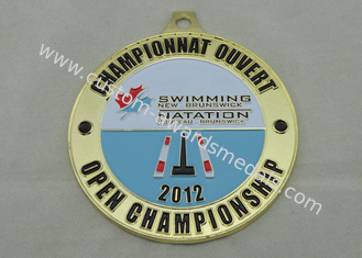 Médaille d'émail du Nouveau Brunswick de natation, placage à l'or, érosion des deux côtés